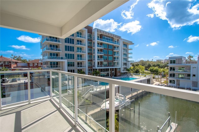 balcony featuring a water view