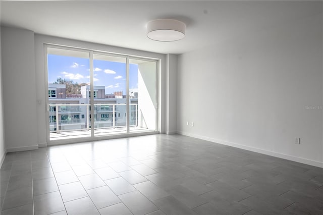 view of tiled spare room