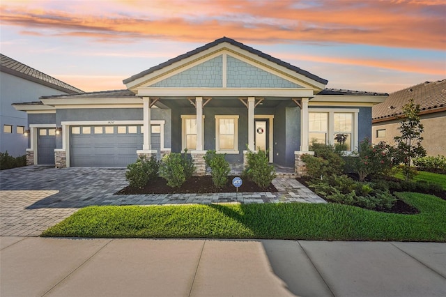 craftsman inspired home with a garage