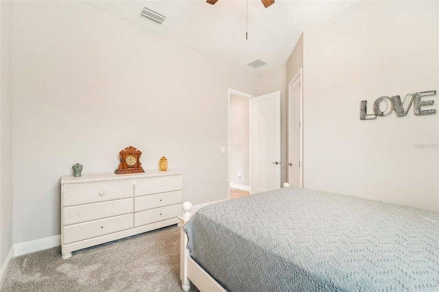 bedroom with light colored carpet and ceiling fan