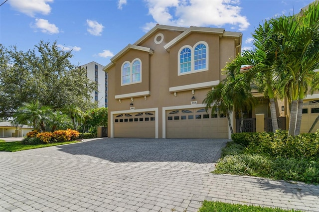 view of front of property featuring a garage