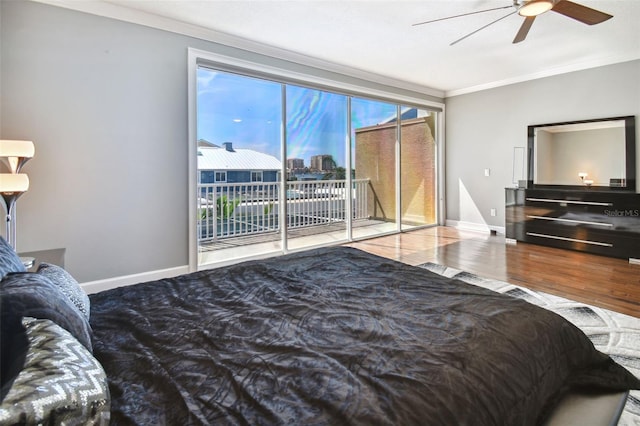 bedroom featuring crown molding, hardwood / wood-style floors, access to exterior, and ceiling fan