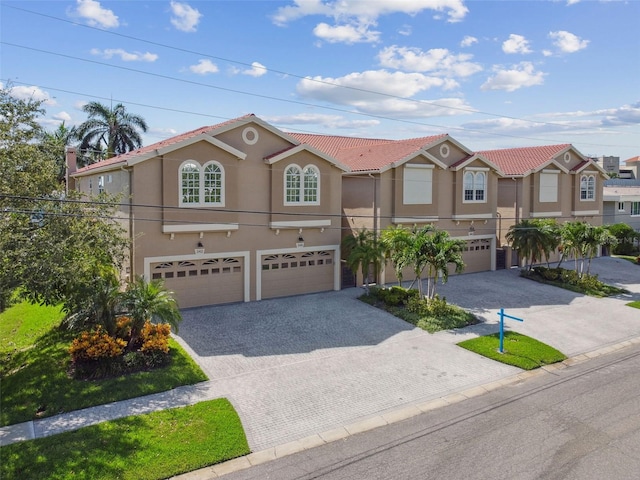 view of front of home with a garage