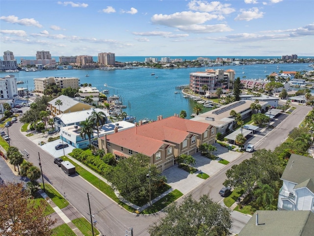 birds eye view of property featuring a water view