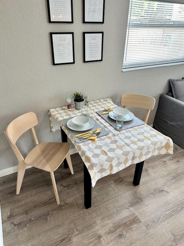 dining room featuring light hardwood / wood-style floors