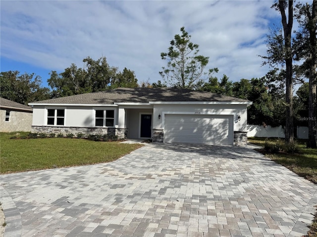 ranch-style home with a garage and a front yard