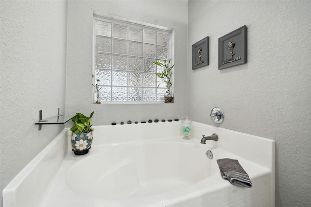 bathroom with a bathing tub