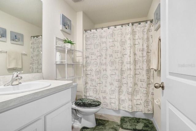 full bathroom featuring vanity, toilet, shower / bathtub combination with curtain, and tile patterned flooring