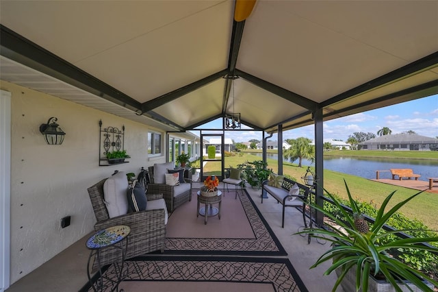 view of patio featuring an outdoor living space and a water view