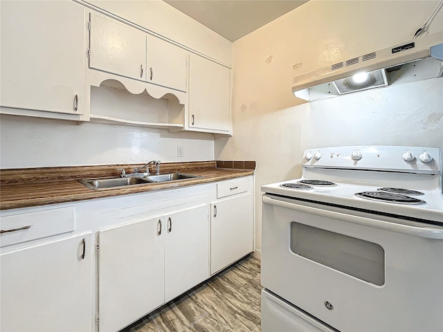 kitchen featuring white electric range, extractor fan, sink, and white cabinets