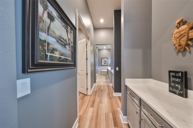 hallway featuring light wood-type flooring