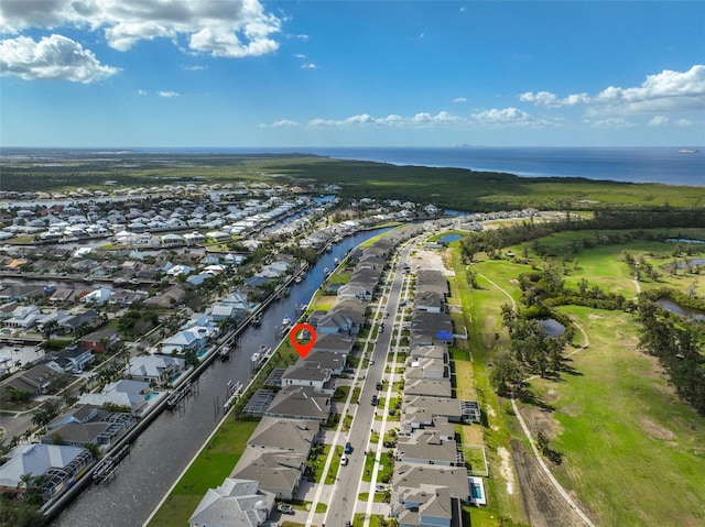 bird's eye view with a water view