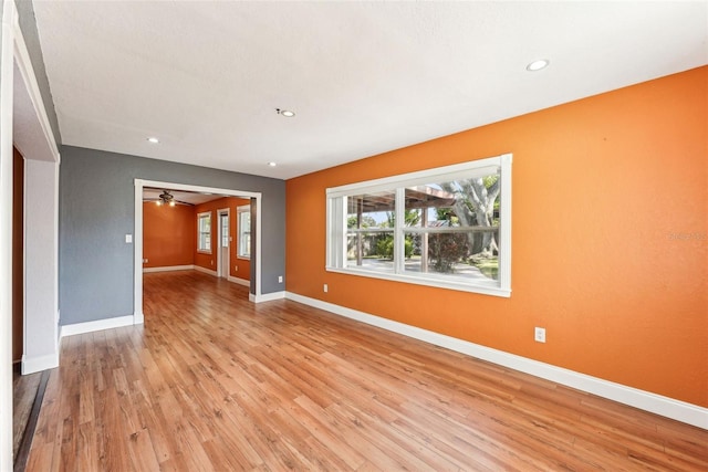 unfurnished room featuring light wood-type flooring