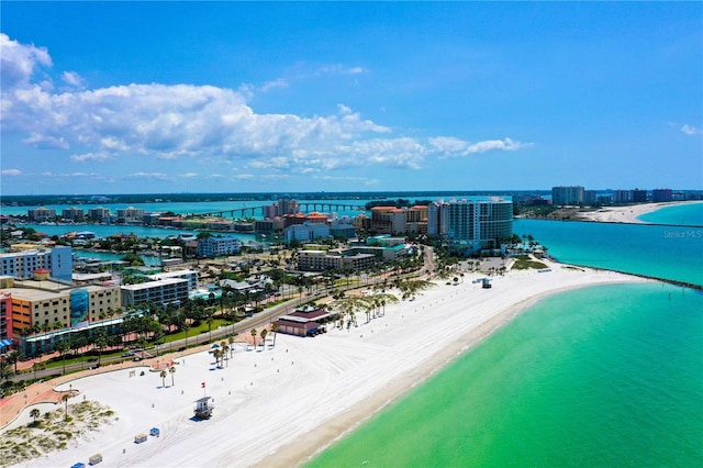 bird's eye view with a beach view and a water view