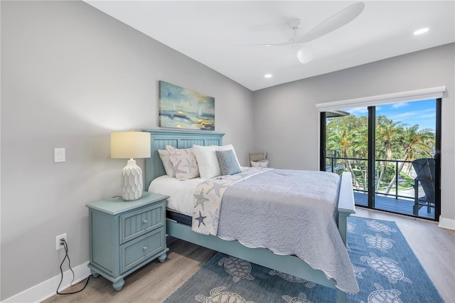 bedroom featuring access to outside, ceiling fan, and wood-type flooring