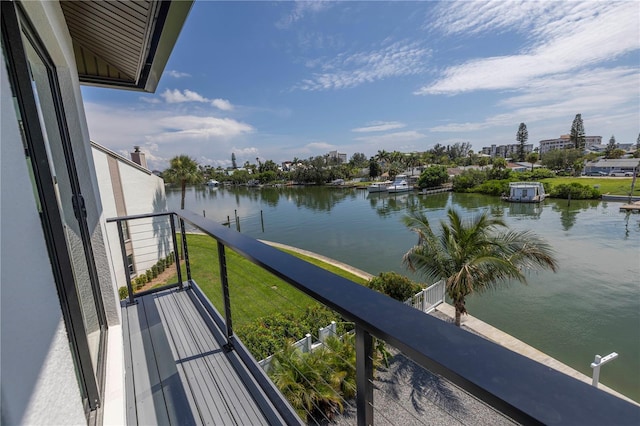 balcony featuring a water view