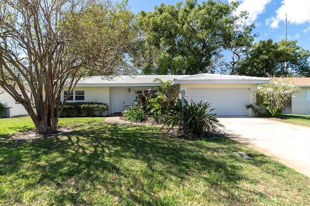 ranch-style house with a front lawn and a garage