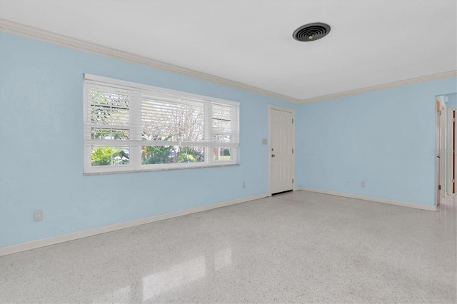 spare room with ornamental molding