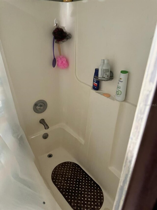 111 Carillo St NE, Palm Bay, FL 32907 - bathroom featuring shower / tub combo