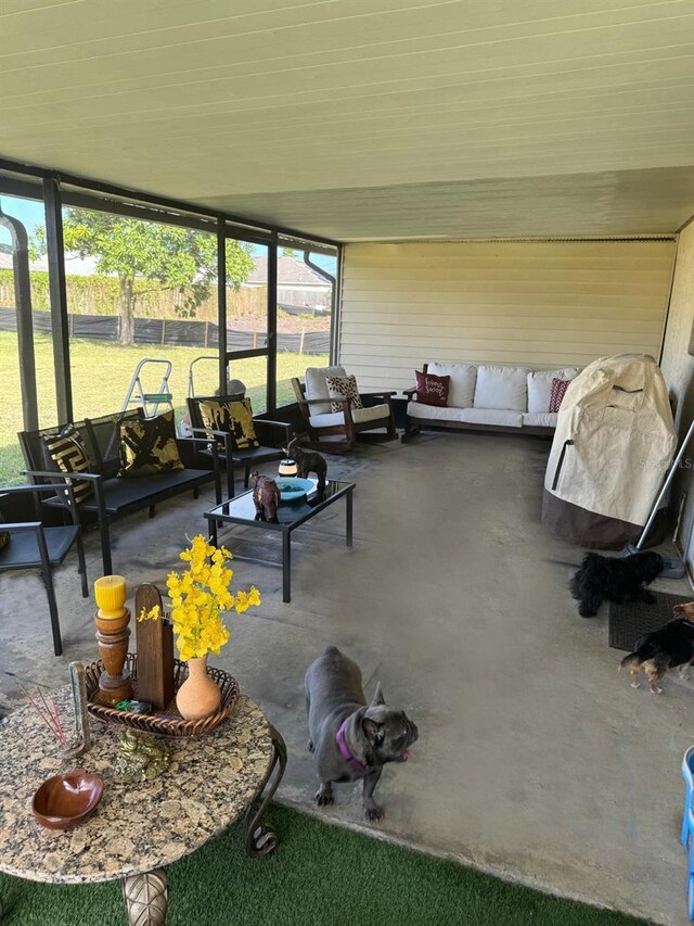 111 Carillo St NE, Palm Bay, FL 32907 - sunroom / solarium with healthy amount of natural light and an outdoor hangout area