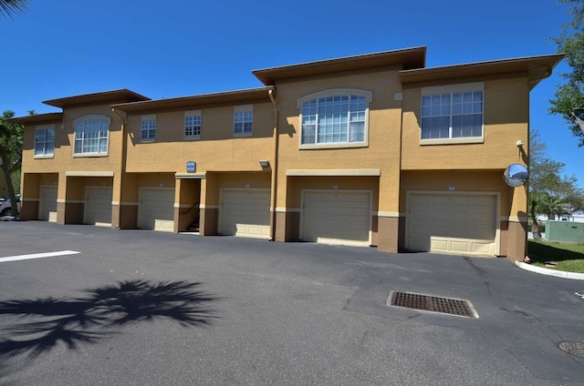 view of property with a garage