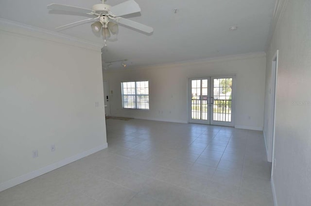 4336 Bayside Village Dr Unit 201, Tampa, FL 33615 - empty room with crown molding, light tile patterned floors, french doors, ceiling fan, and rail lighting