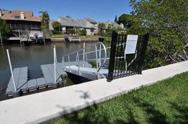 4336 Bayside Village Dr Unit 201, Tampa, FL 33615 - dock area featuring a water view and a residential view