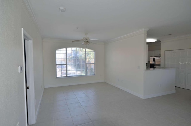 4336 Bayside Village Dr Unit 201, Tampa, FL 33615 - spare room featuring ceiling fan, light tile patterned floors, ornamental molding, and a smoke detector