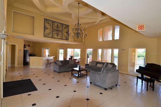 4336 Bayside Village Dr Unit 201, Tampa, FL 33615 - living area featuring a towering ceiling, a chandelier, light tile patterned flooring, coffered ceiling, and beam ceiling