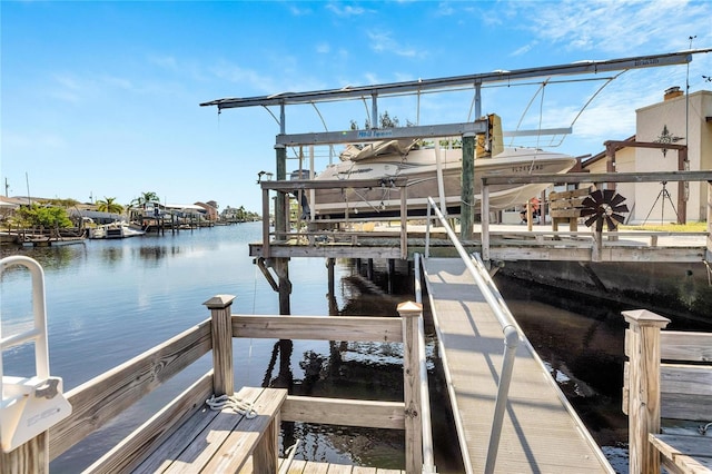 view of dock with a water view