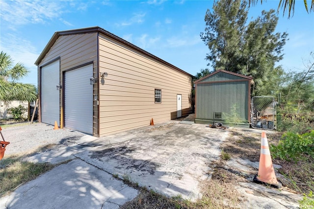 view of outbuilding with a garage