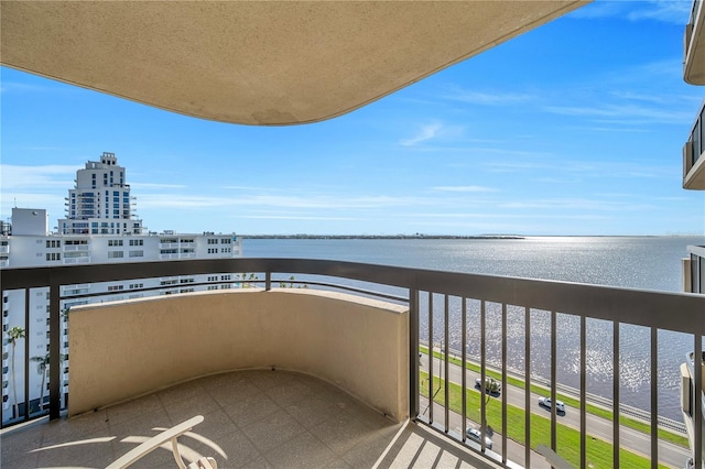 balcony featuring a water view