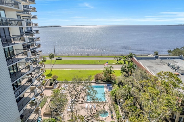 birds eye view of property featuring a water view