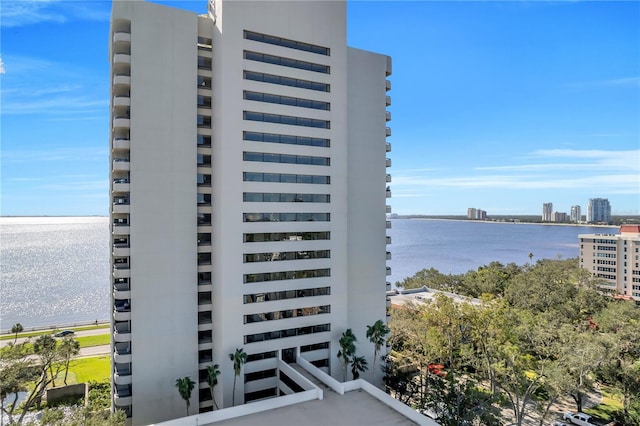 view of building exterior featuring a water view