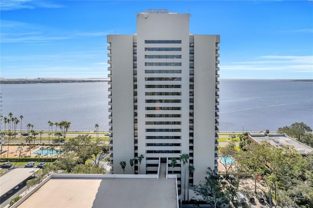 view of building exterior featuring a water view