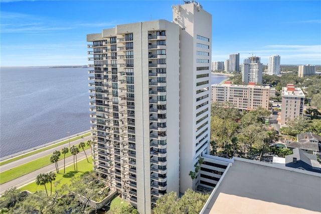 view of building exterior with a water view