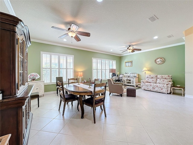 dining room featuring ornamental molding and ceiling fan