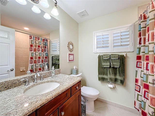 bathroom featuring vanity, toilet, tile patterned floors, and curtained shower