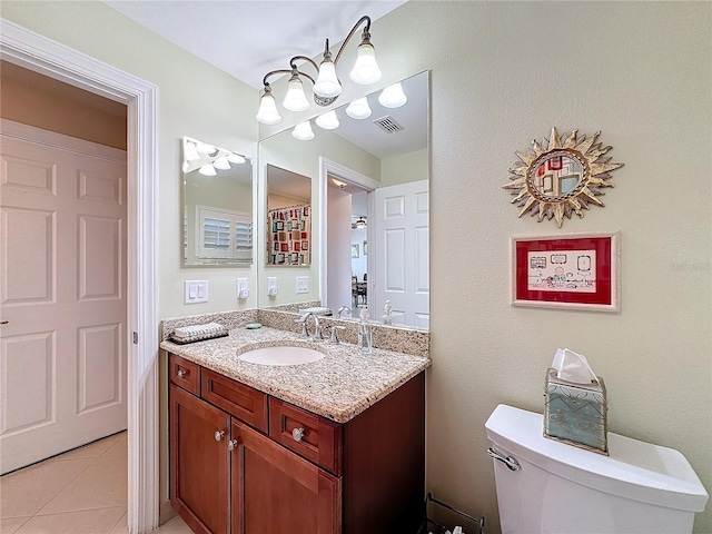 15810 Cobble Mill Dr, Wimauma, FL 33598 - bathroom featuring vanity, toilet, and tile patterned floors