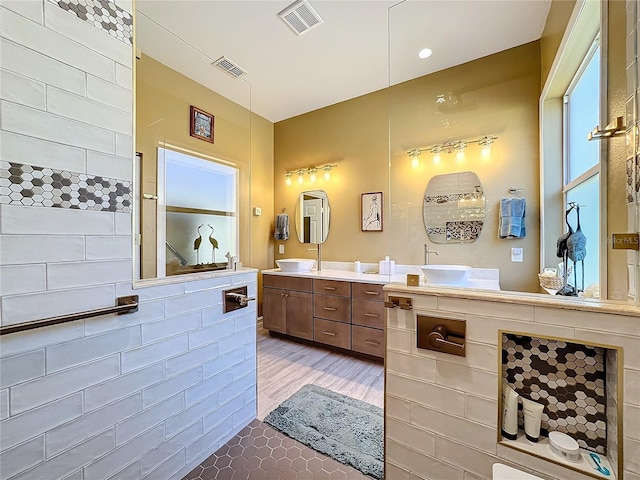 bathroom with vanity and wood-type flooring