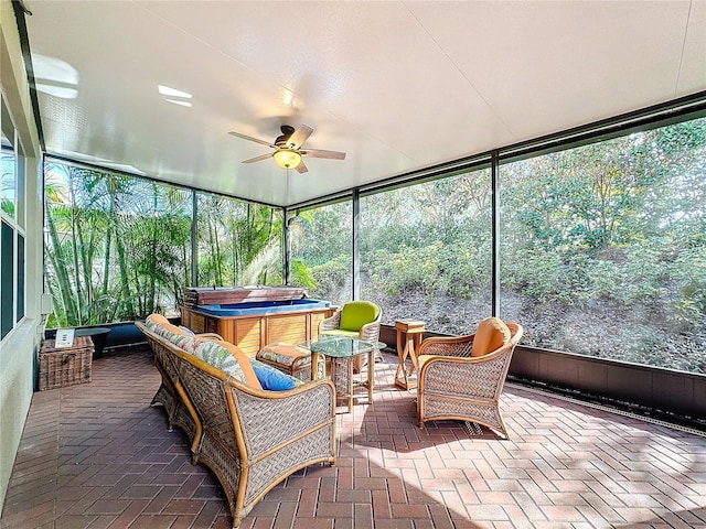 15810 Cobble Mill Dr, Wimauma, FL 33598 - sunroom with a jacuzzi, ceiling fan, and plenty of natural light