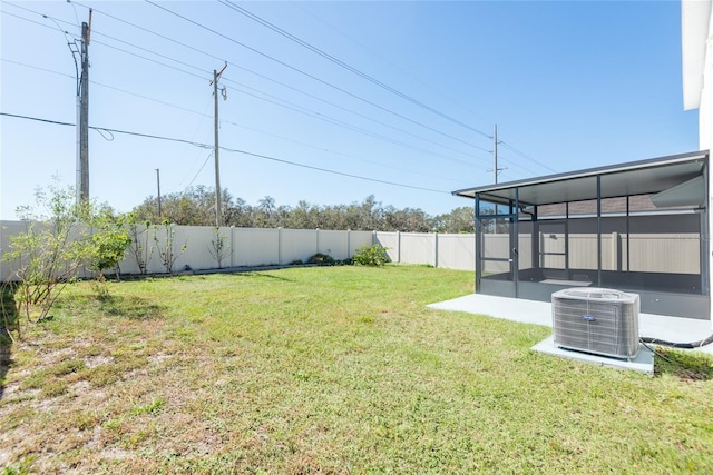 view of yard featuring a patio area and central AC unit