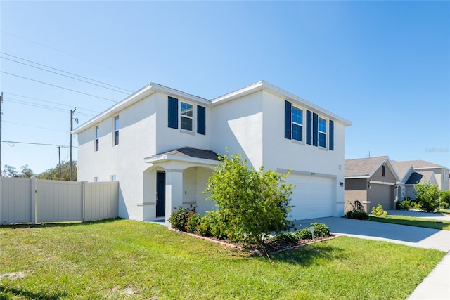 view of front facade with a garage and a front lawn