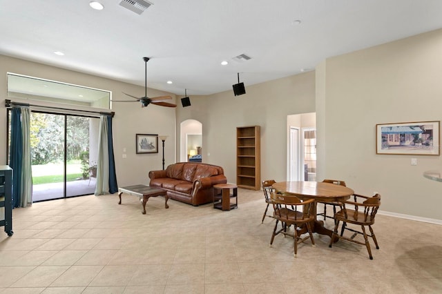 3320 Majestic View Dr, Lutz, FL 33558 - dining space featuring arched walkways, light tile patterned floors, recessed lighting, ceiling fan, and baseboards