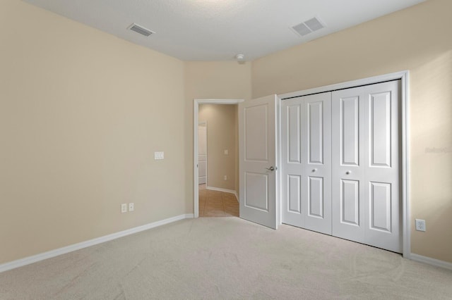 3320 Majestic View Dr, Lutz, FL 33558 - unfurnished bedroom featuring carpet floors, baseboards, and a closet