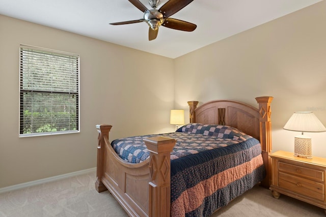 3320 Majestic View Dr, Lutz, FL 33558 - bedroom with light colored carpet, baseboards, and a ceiling fan