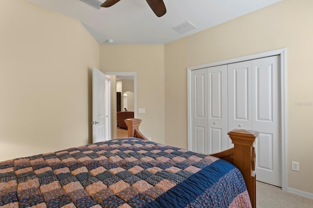 3320 Majestic View Dr, Lutz, FL 33558 - bedroom with light colored carpet, a closet, a ceiling fan, and baseboards