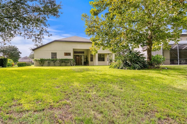 3320 Majestic View Dr, Lutz, FL 33558 - view of front of property with a front yard and stucco siding