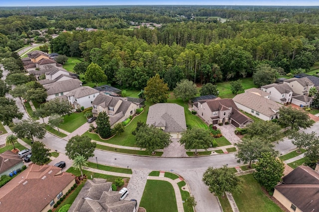 3320 Majestic View Dr, Lutz, FL 33558 - aerial view of property and surrounding area with a forest and nearby suburban area