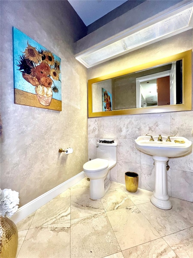 bathroom featuring toilet